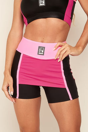 Conjunto Fitness Elláda Rosa Shorts Saia